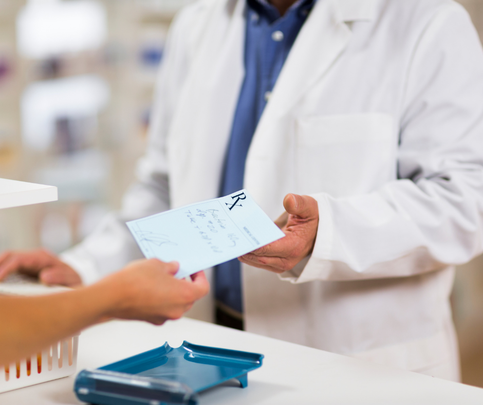 Image of a pharmacist filling a prescription